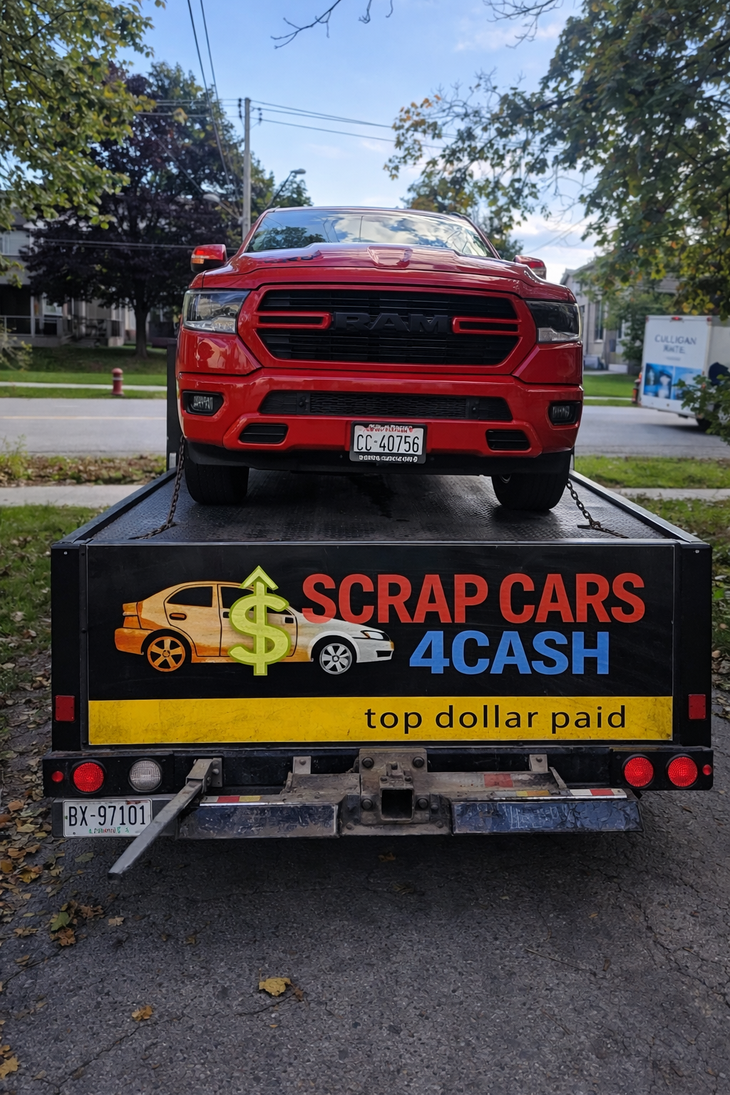 Scrap Cars 4 Cash tow truck picking up vehicle in Newmarket